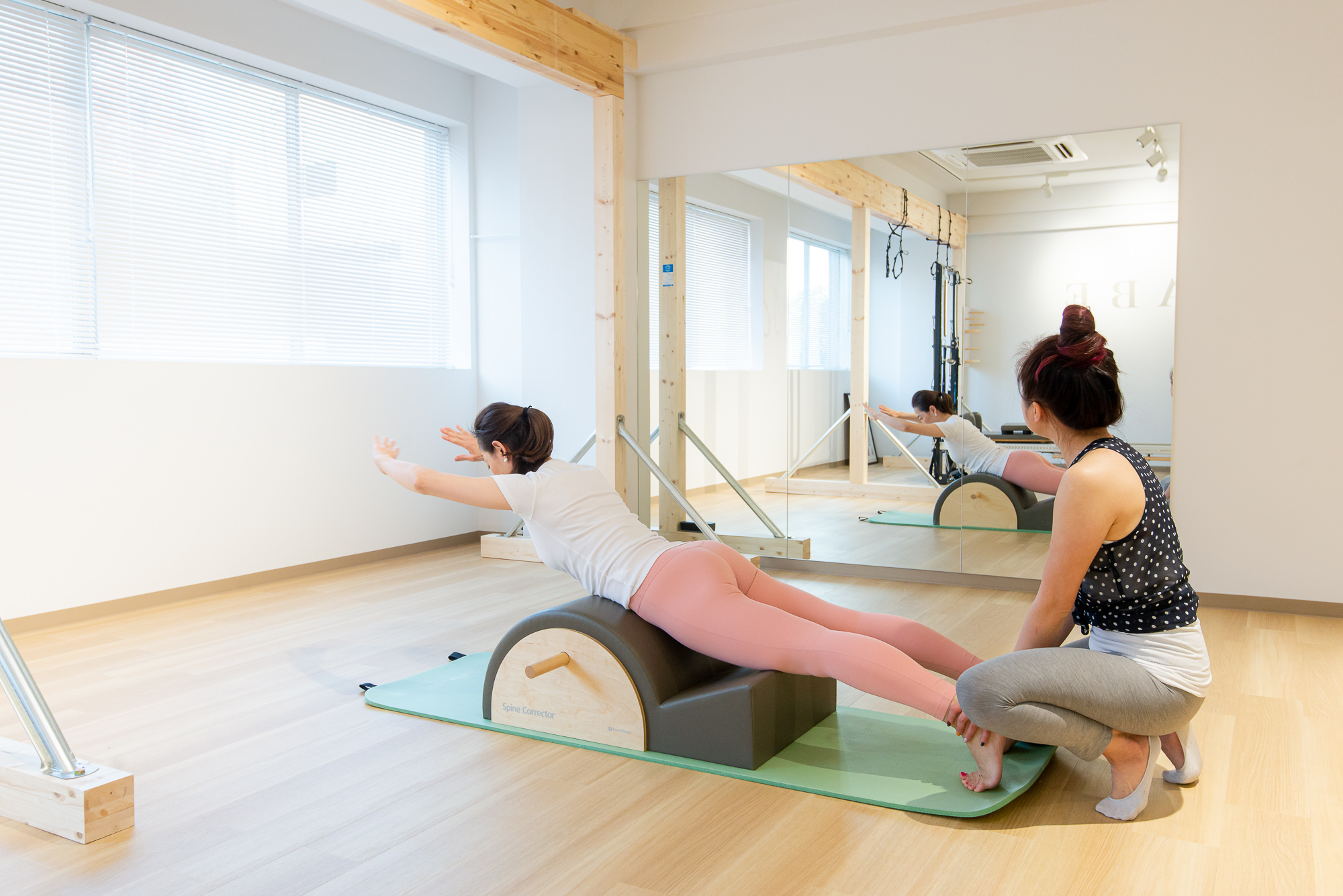 pilates exercise on spine corrector